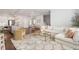 Open floor plan shows living room and kitchen with a stylish sofa and modern island at 396 Silverbell Way, Marietta, GA 30060