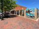 Downtown streetscape featuring brick sidewalks, art installations, and local businesses under a bright blue sky at 396 Silverbell Way, Marietta, GA 30060
