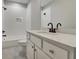 Clean bathroom with a white tiled shower and modern vanity at 1679 Eastside Parc St, Atlanta, GA 30316