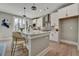 Modern kitchen with white cabinets, quartz countertops, and stainless steel appliances at 1679 Eastside Parc St, Atlanta, GA 30316