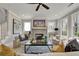Relaxing living room with fireplace, ample natural light, and stylish decor at 1679 Eastside Parc St, Atlanta, GA 30316