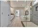 Main bathroom with double vanity and walk in shower at 1679 Eastside Parc St, Atlanta, GA 30316