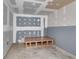 Unfinished basement with a wooden platform and block walls at 166 Greentree Trl, Temple, GA 30179