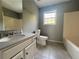 Bathroom includes single vanity and shower/tub combo at 166 Greentree Trl, Temple, GA 30179