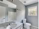 Clean bathroom with a tub, toilet, and vanity at 166 Greentree Trl, Temple, GA 30179