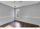 Simple bedroom with wood floors and one window at 166 Greentree Trl, Temple, GA 30179