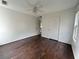Bright bedroom with wood flooring and ceiling fan at 166 Greentree Trl, Temple, GA 30179