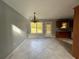 Dining room with tile floors and a chandelier at 166 Greentree Trl, Temple, GA 30179