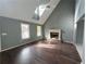 Spacious living room with hardwood floors and a fireplace at 166 Greentree Trl, Temple, GA 30179
