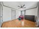 Well-lit bedroom with hardwood floors and built-in storage at 2357 Lynn Iris Dr, Decatur, GA 30032