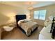 Comfortable bedroom with plush bed and ample natural light at 3909 Makeover Ct, Atlanta, GA 30349