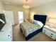 Spacious bedroom with a plush bed and plenty of light at 3909 Makeover Ct, Atlanta, GA 30349