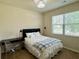 Bedroom with a queen bed, a small desk and chair at 3909 Makeover Ct, Atlanta, GA 30349
