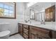 Clean, bright bathroom with marble countertop, white subway tile, and double vanity at 239 Cedar Ridge Dr, Dallas, GA 30157