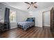 Bedroom with hardwood floors, gray walls, and plenty of light at 239 Cedar Ridge Dr, Dallas, GA 30157