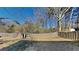 Fenced backyard with grassy area, providing a private outdoor space at 6146 Douglas Manor Ct, Douglasville, GA 30134