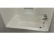 Clean bathtub and shower combination at 6146 Douglas Manor Ct, Douglasville, GA 30134