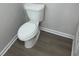 Simple, updated bathroom with a new toilet and flooring at 6146 Douglas Manor Ct, Douglasville, GA 30134