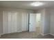 Bedroom with double door closet and neutral decor at 6146 Douglas Manor Ct, Douglasville, GA 30134