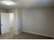 Simple bedroom with neutral walls and carpet at 6146 Douglas Manor Ct, Douglasville, GA 30134