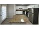 Updated kitchen with granite countertops and stainless steel appliances at 6146 Douglas Manor Ct, Douglasville, GA 30134