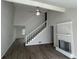 Spacious living room with fireplace and vaulted ceilings at 6146 Douglas Manor Ct, Douglasville, GA 30134