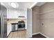 Kitchen with stainless steel appliances and pantry at 818 Victoria Pl, Woodstock, GA 30189