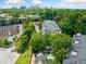 Community with lush greenery and city skyline in the background at 3636 Habersham Nw Rd # 1108, Atlanta, GA 30305