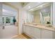 Clean bathroom with a vanity, and view into bedroom at 3636 Habersham Nw Rd # 1108, Atlanta, GA 30305