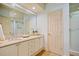 Elegant bathroom with double vanity and large mirror at 3636 Habersham Nw Rd # 1108, Atlanta, GA 30305