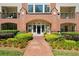 Attractive brick building exterior with manicured landscaping and inviting entryway at 3636 Habersham Nw Rd # 1108, Atlanta, GA 30305