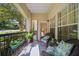 Inviting front porch with wicker chairs, creating a relaxing outdoor space at 3636 Habersham Nw Rd # 1108, Atlanta, GA 30305