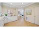 Modern white kitchen with breakfast bar and view to living room at 3636 Habersham Nw Rd # 1108, Atlanta, GA 30305