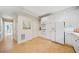 White kitchen with stainless steel appliances and tile floor at 3636 Habersham Nw Rd # 1108, Atlanta, GA 30305