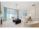 Spacious living room featuring a fireplace and ample natural light at 3636 Habersham Nw Rd # 1108, Atlanta, GA 30305