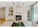 Living room features a fireplace and built-in shelving at 3636 Habersham Nw Rd # 1108, Atlanta, GA 30305