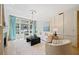 Sunlit living room with a fireplace and comfortable seating at 3636 Habersham Nw Rd # 1108, Atlanta, GA 30305