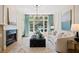 Spacious living room with fireplace and views to dining area at 3636 Habersham Nw Rd # 1108, Atlanta, GA 30305