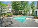 Refreshing community pool with surrounding brickwork and lounge chairs at 3636 Habersham Nw Rd # 1108, Atlanta, GA 30305