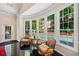 Relaxing pool area view from sunroom with comfortable seating at 3636 Habersham Nw Rd # 1108, Atlanta, GA 30305