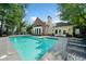 Relaxing community pool area with lounge chairs and adjacent building at 3636 Habersham Nw Rd # 1108, Atlanta, GA 30305