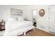 Bedroom with queen-size bed and ensuite bathroom at 9057 Selborne Ln, Chattahoochee Hills, GA 30268