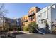 Shared courtyard with multiple buildings and landscaping at 9057 Selborne Ln, Chattahoochee Hills, GA 30268