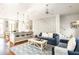 Open living space with kitchen and seating area at 9057 Selborne Ln, Chattahoochee Hills, GA 30268