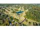 An aerial view shows a lush golf course with ponds and tree-lined fairways at 133 Blackland Nw Rd, Atlanta, GA 30342