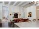 Dining room with modern table and chairs, fireplace, and an open view to other living spaces at 133 Blackland Nw Rd, Atlanta, GA 30342