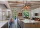 Gourmet kitchen with an oversized island, marble countertops, and stainless steel appliances at 133 Blackland Nw Rd, Atlanta, GA 30342