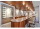 Common area bar with a long granite countertop at 2575 Peachtree Ne Rd # 9G, Atlanta, GA 30305