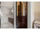 Elegant bathroom with marble finishes and a large soaking tub at 2575 Peachtree Ne Rd # 9G, Atlanta, GA 30305