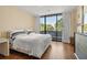 Bright bedroom with a comfortable bed and access to a private balcony at 2575 Peachtree Ne Rd # 9G, Atlanta, GA 30305